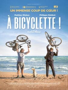 À bicyclette